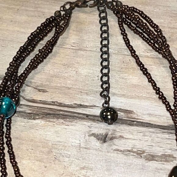 Glass Beads On 5 Strands With Copper Colored Sead Beads - Picture 4 of 6